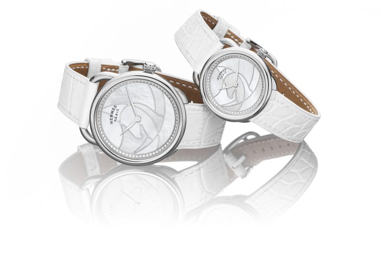 Hermes Arceau Cavils watches with white mother of pearl dial and Cavales horse motif.