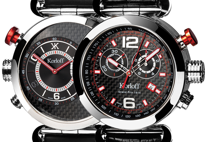 The OO2 version features black carbon fiber dial and red accents. 