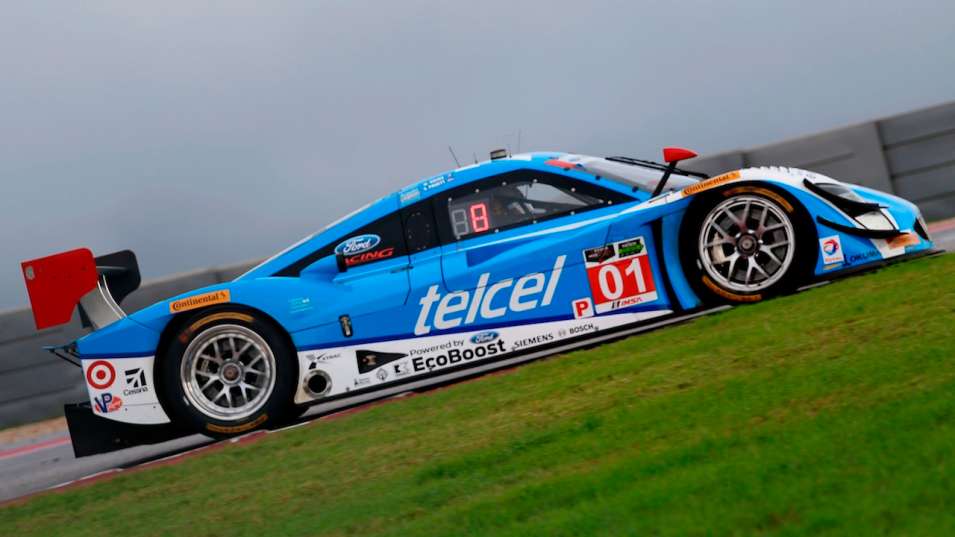 Scott Pruett in No. 01 Chip Ganassi Racing entry wins the Lone Star ... photo c) Getty Images. 
