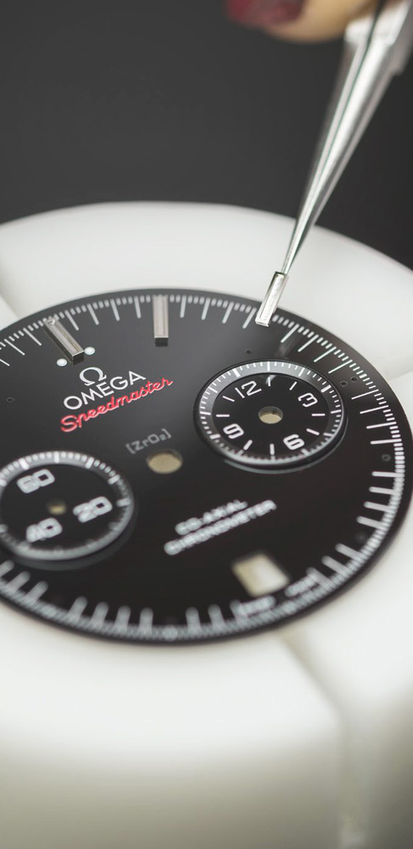A special etching process, along with a host of high-tech steps, go into the making of the Omega Speedmaster Dark Side of the Moon. 