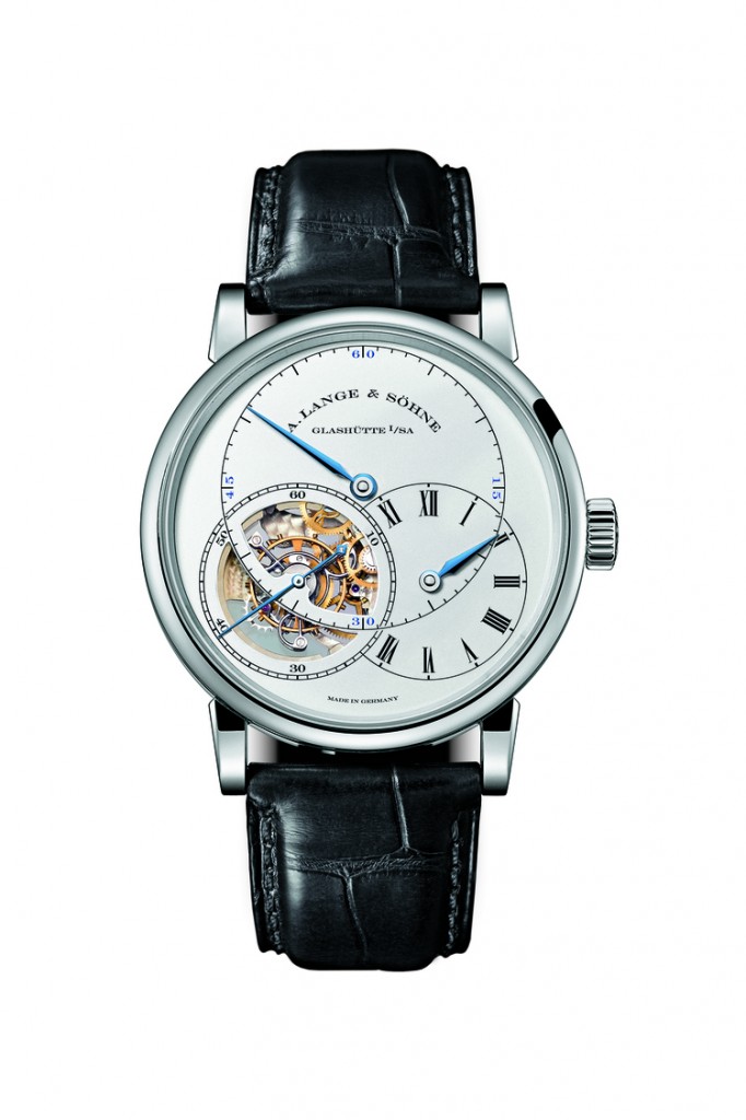 The new white gold Richard Lange Pour le Merit watch with blued steel hands is seen here with the hour dial not fully open-- totally exposing the tourbillon escapement. 
