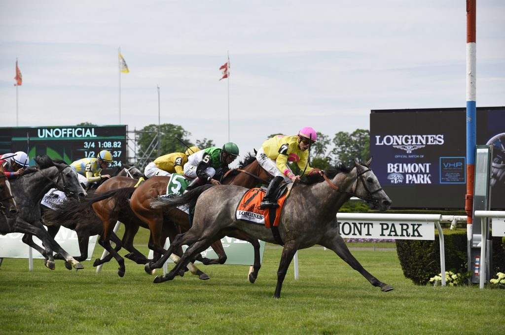 A Raving Beauty, ridden by Irad Ortiz, Jr., wins the 25th running of the Longines Just A Game race, Saturday, June 9, 2018, at Belmont Park in Elmont, NY. Longines, the Swiss watchmaker known for its elegant timepieces, is the Official Timekeeper and Watch of the 150th running of the Belmont Stakes. (Photo by Diane Bondareff/AP Images for Longines)
