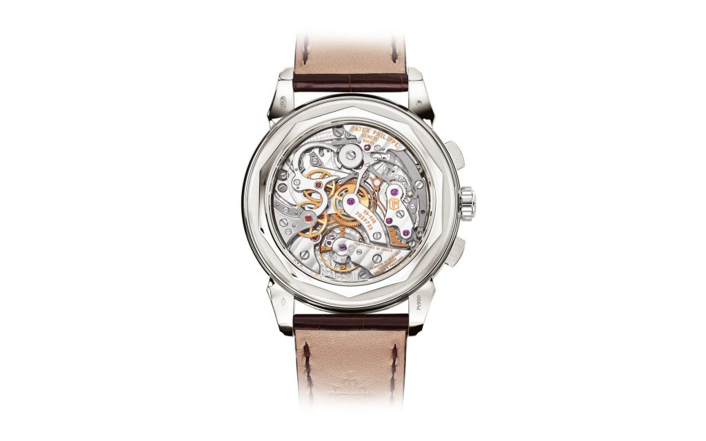 The newest Patek Philippe Ref. 5720 is crafted in platinum with a salmon colored dial. 