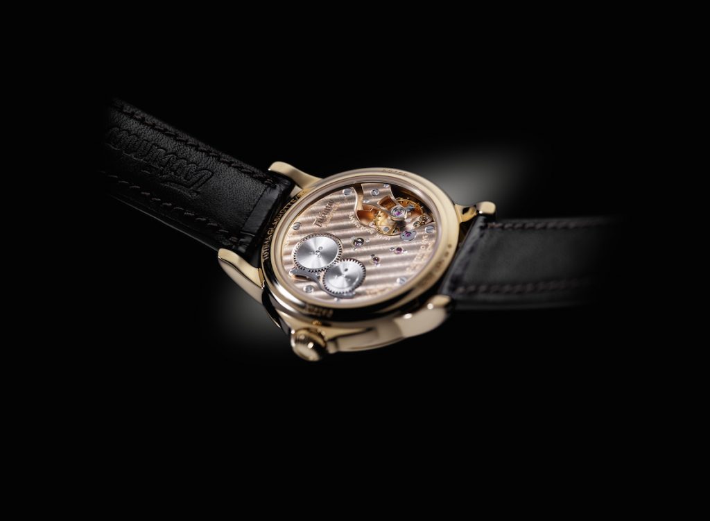 The exquisite German-made movement of the Tutima Patria is visible via a transparent sapphire casebook. 