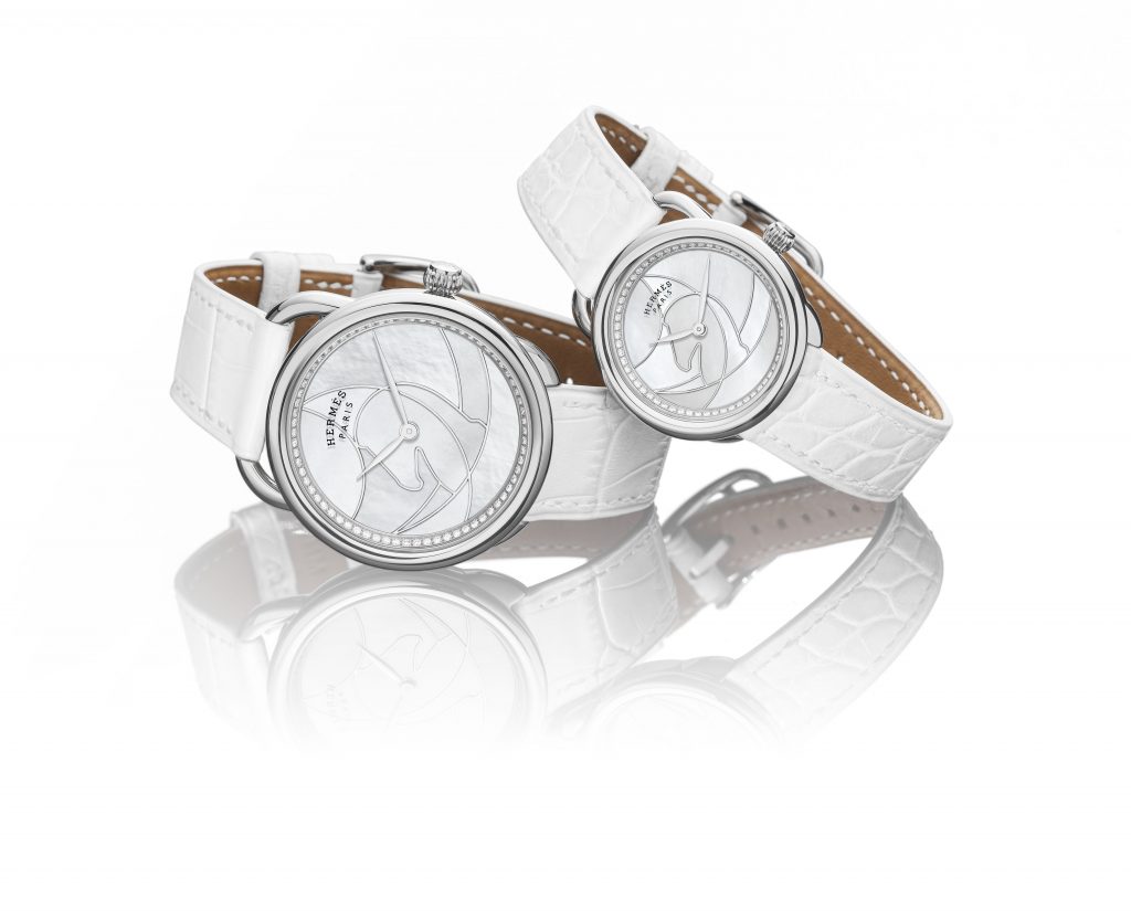 Hermes Arceau Cavils watches with white mother of pearl dial and Cavales horse motif. 