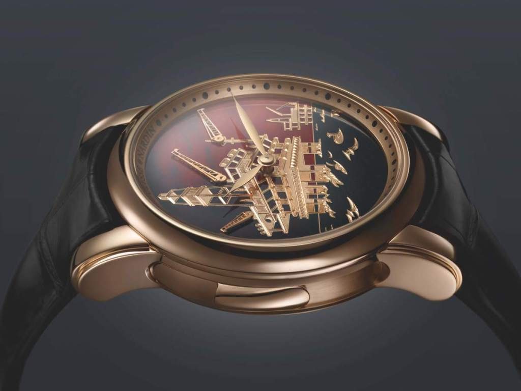 The dial of the Ulysse Nardin North Sea Minute Repeater features a carved 18-karat gold oil rig and a champleve enamel background.