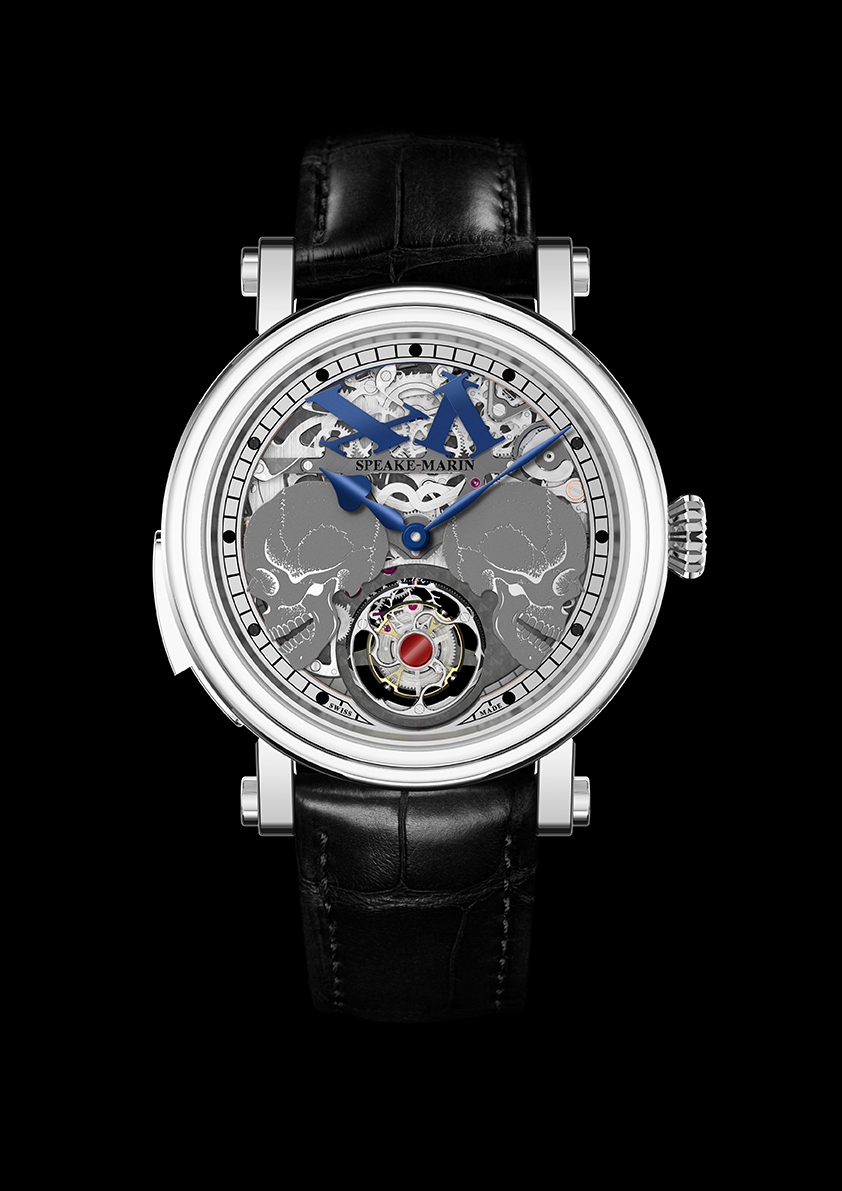 When the skulls move aside to reveal the tourbillon, the numerals at 12:00 also "fall apart." 