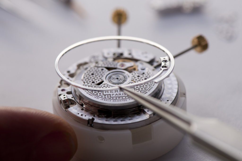 The Hermes Impatient Hour watch is built so that the dial does not touch the case sides, enabling the gong to chime with better acoustic output. 