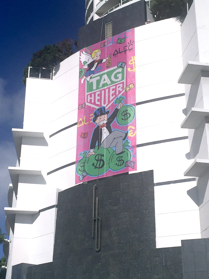 Alec Monopoly scaled the side wall of Fontainebleau Hotel, paining on the multi-story mural along the way. 