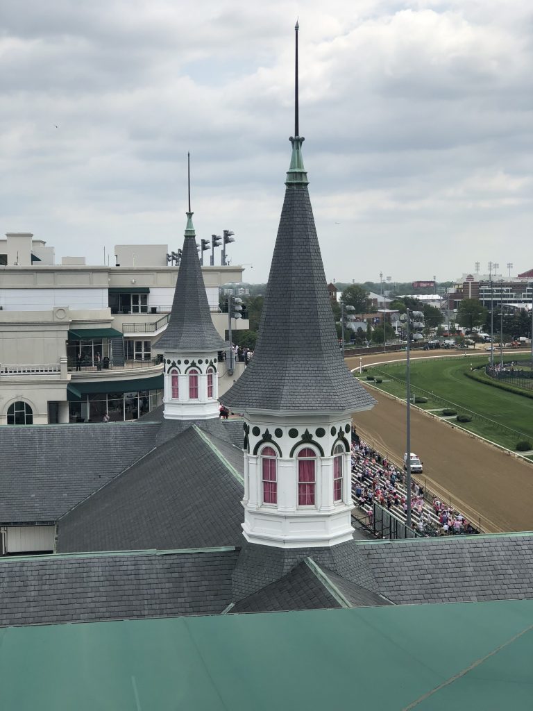The famous twin spires of Churchill Downs served as a beacon for early derby goers in the late 1800s. 