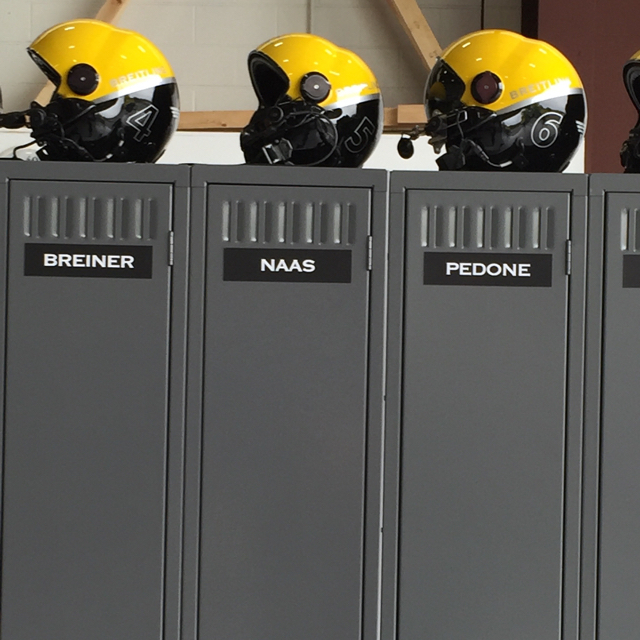 Lockers and helmets at the Breitling event.