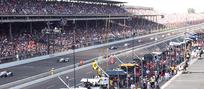 The cars coming into the first turn 