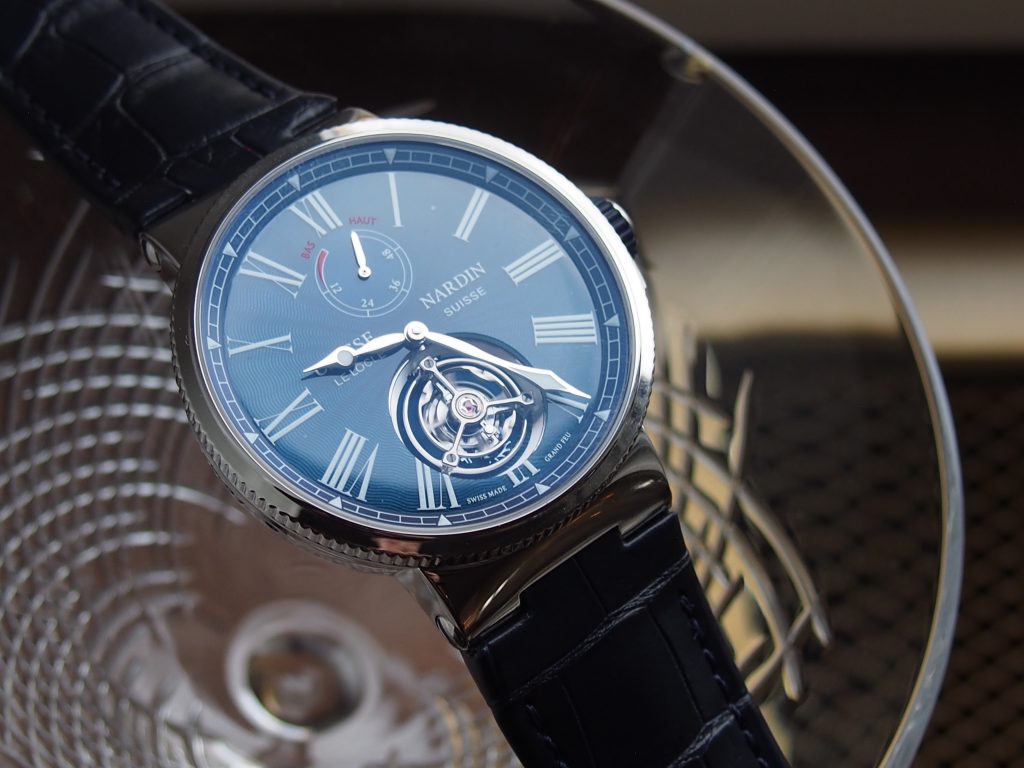 The Ulysse Nardin Marine Tourbillon Blue Grand Feu watch carries an amazing price point for a tourbillon. 