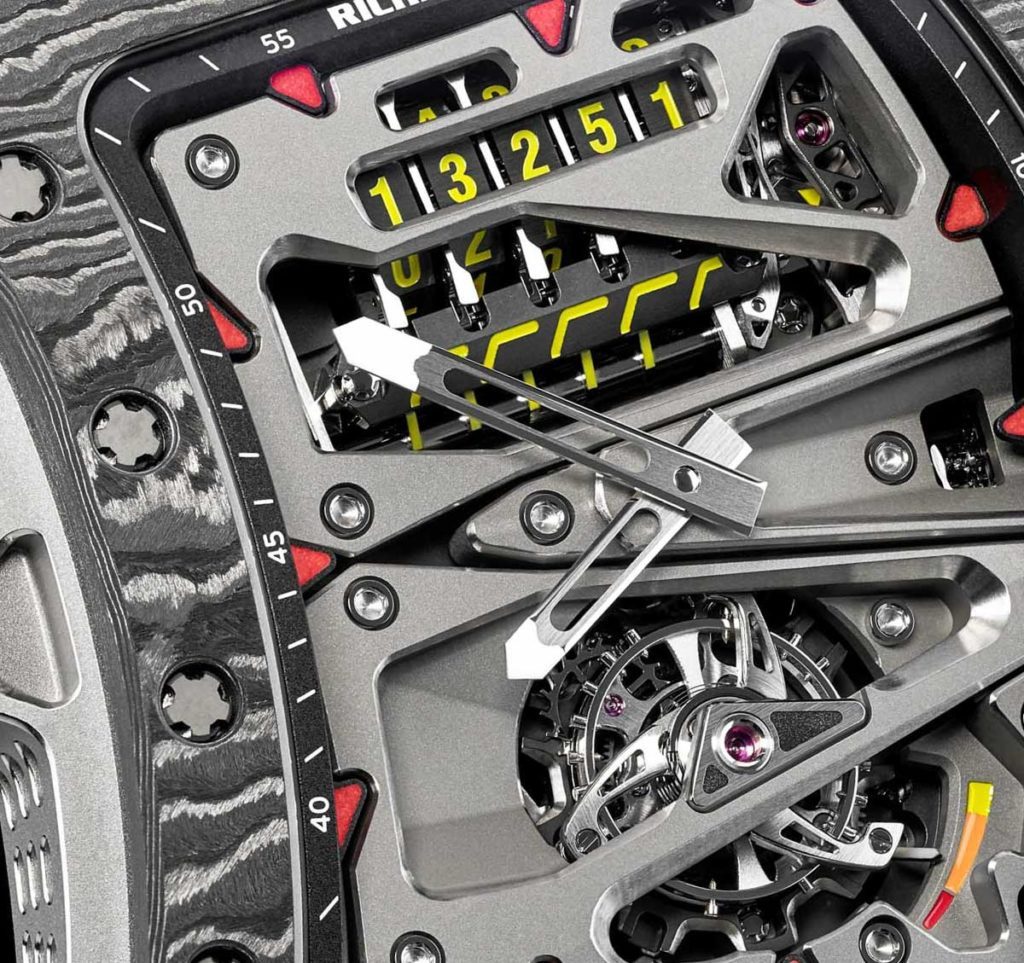 The Richard Mille RM 07-01 Tourbillon Alain Prost watch houses an odometer with five rollers. 