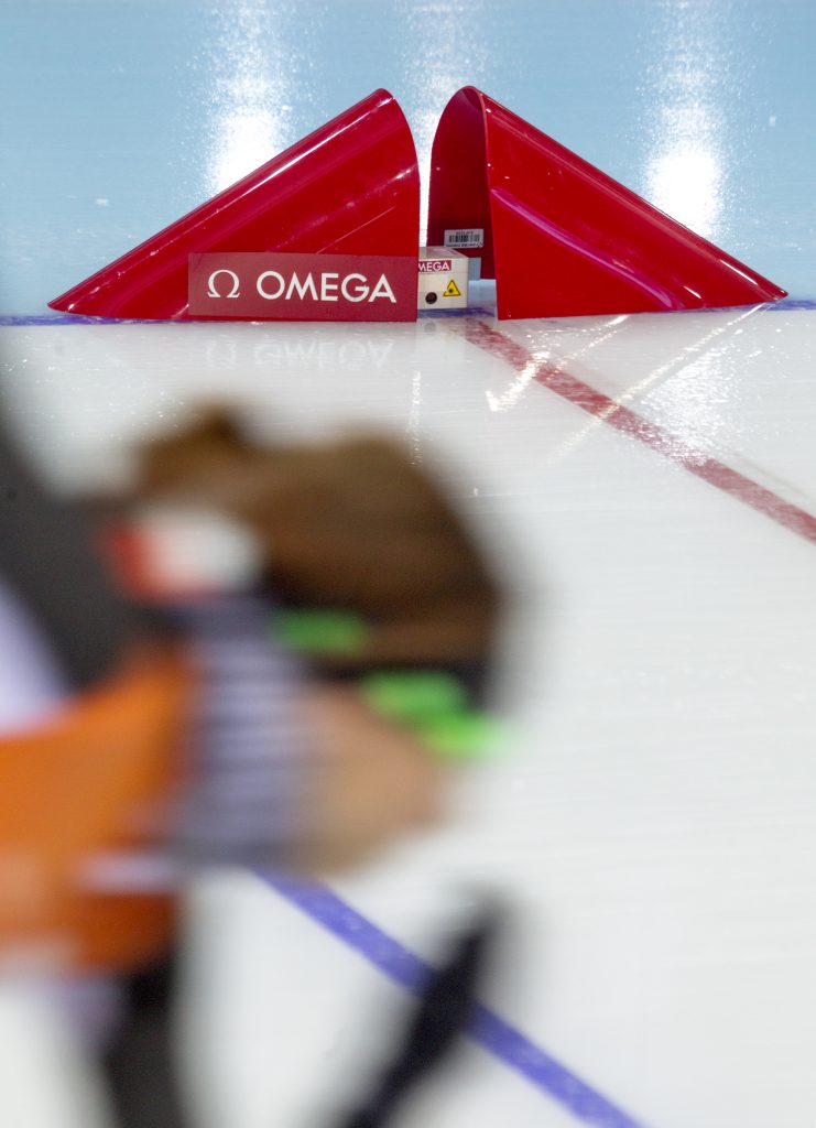 Speed skating at the Winter Olympics, timed by Omega.