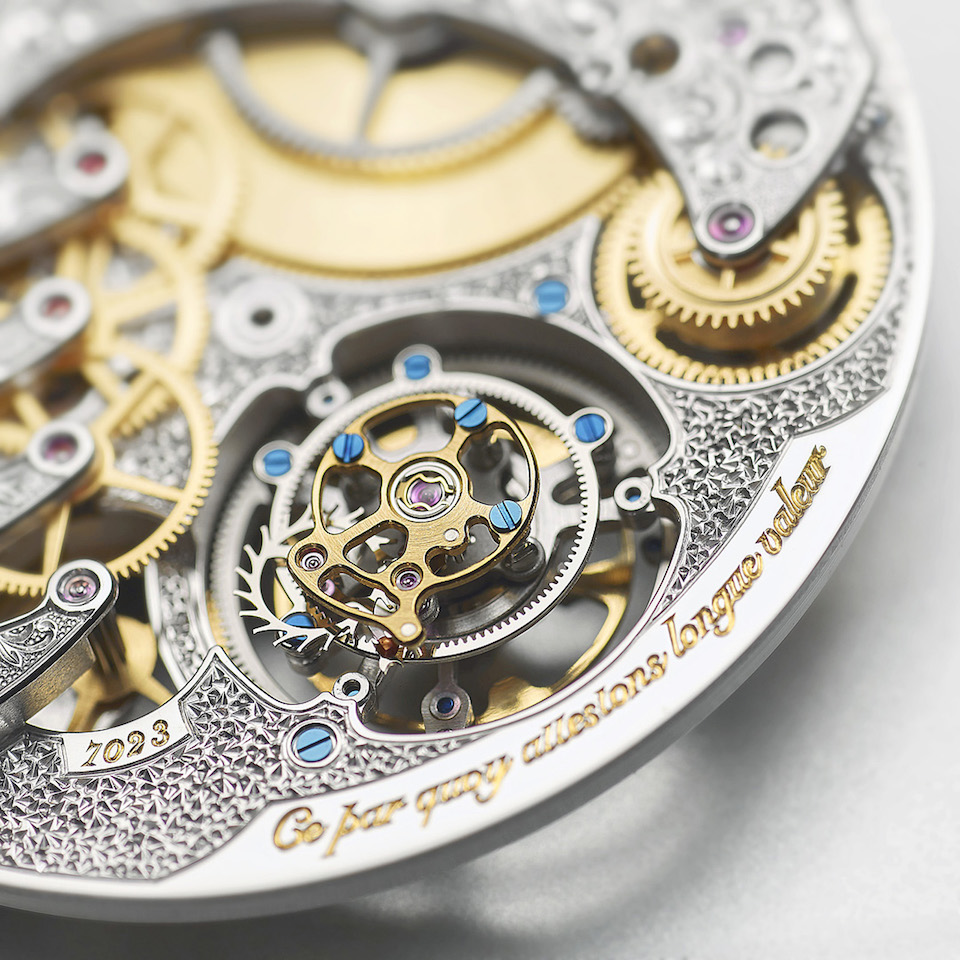 The complex caliber carries three patents and features flying tourbillon with seconds hand. 