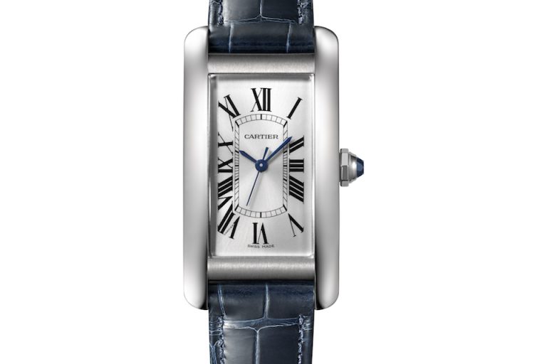 WSTA0017 This year marks the first offering of the Cartier Tank Américaine in steel with a unique blue strap.