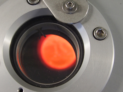 A peek inside the oven at Chopard to see  the gold melting and churning. 