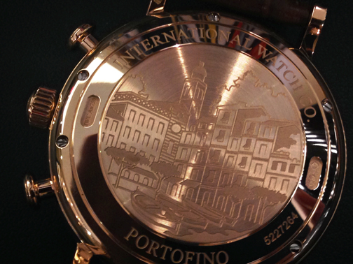 The case back is engraved with a scene from Portofino. 