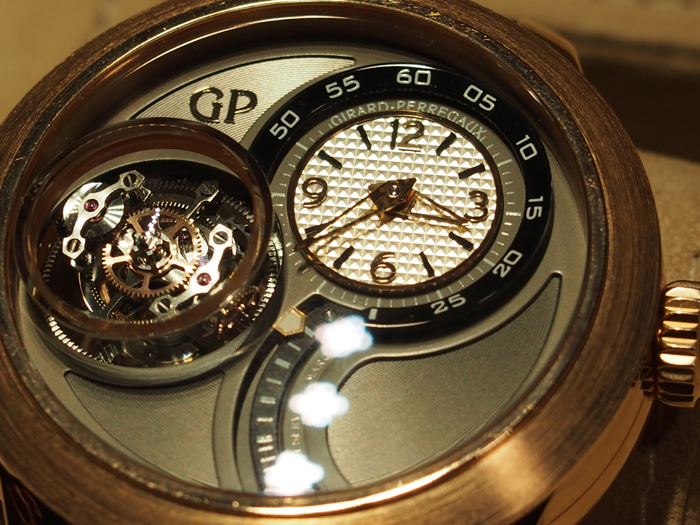 The triple axes of the Tri-Axial Tourbillon are all inside an inner sapphire container that protrudes from the watch dial. 