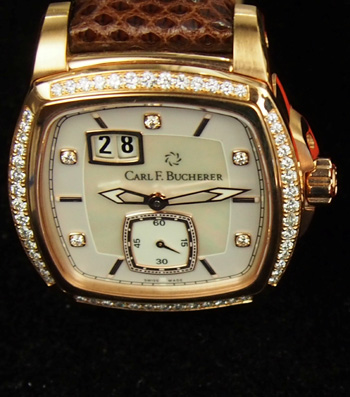 The cushion shape of the case is emulated in the seconds subdial on the shimmering mother-of-pearl dial. 