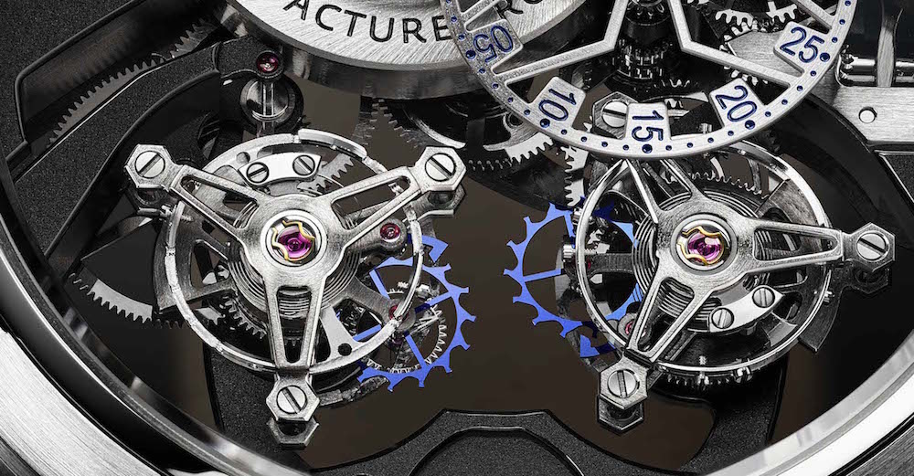 The two tourbillon escapements rotate at different speeds. 