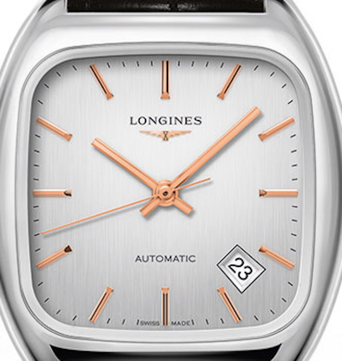 The Longines Heritage 1969 watch is based on an archival piece and features gold stick markers and date at 4:30. 