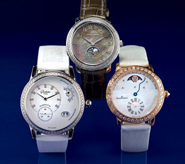 Glashütte Original ladies PanoMatic Luna watch ($19,800); Patek Philippe Ref 4968G mechanically wound Caliber 215 PSLU timepiece ($58,600); Blancpain Quantieme Retrograde Calendar watch ($41,300). Photo by Jeff Gale. 