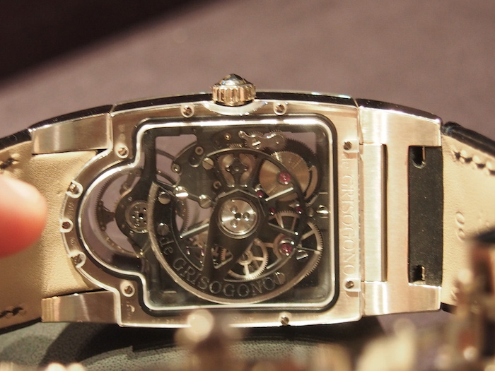 The 266-part movement is visible via the case back 