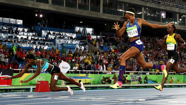 Women's 400M at Rio Summer Olympics has Miller diving to the finish to beat Felix 