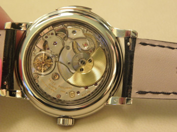 A view of a Patek Philippe minute repeater movement through the caseback. 