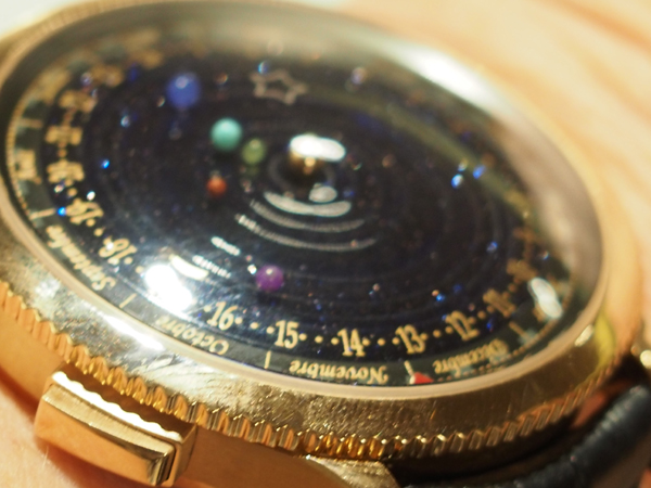 Van Cleef & Arpels Midnight Planetarium on the wrist. 