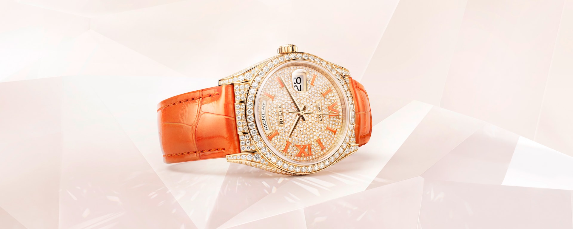 Rolex Day-Date 36mm in diamonds and bold orange. 