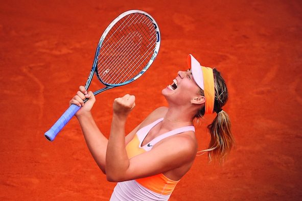 2014 French Open – Day Fourteen Maria Sharapova of Russia celebrates a point during her women's singles final match against Simona Halep of Romania on day fourteen of the French Open