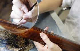 Hand finishing the veneer